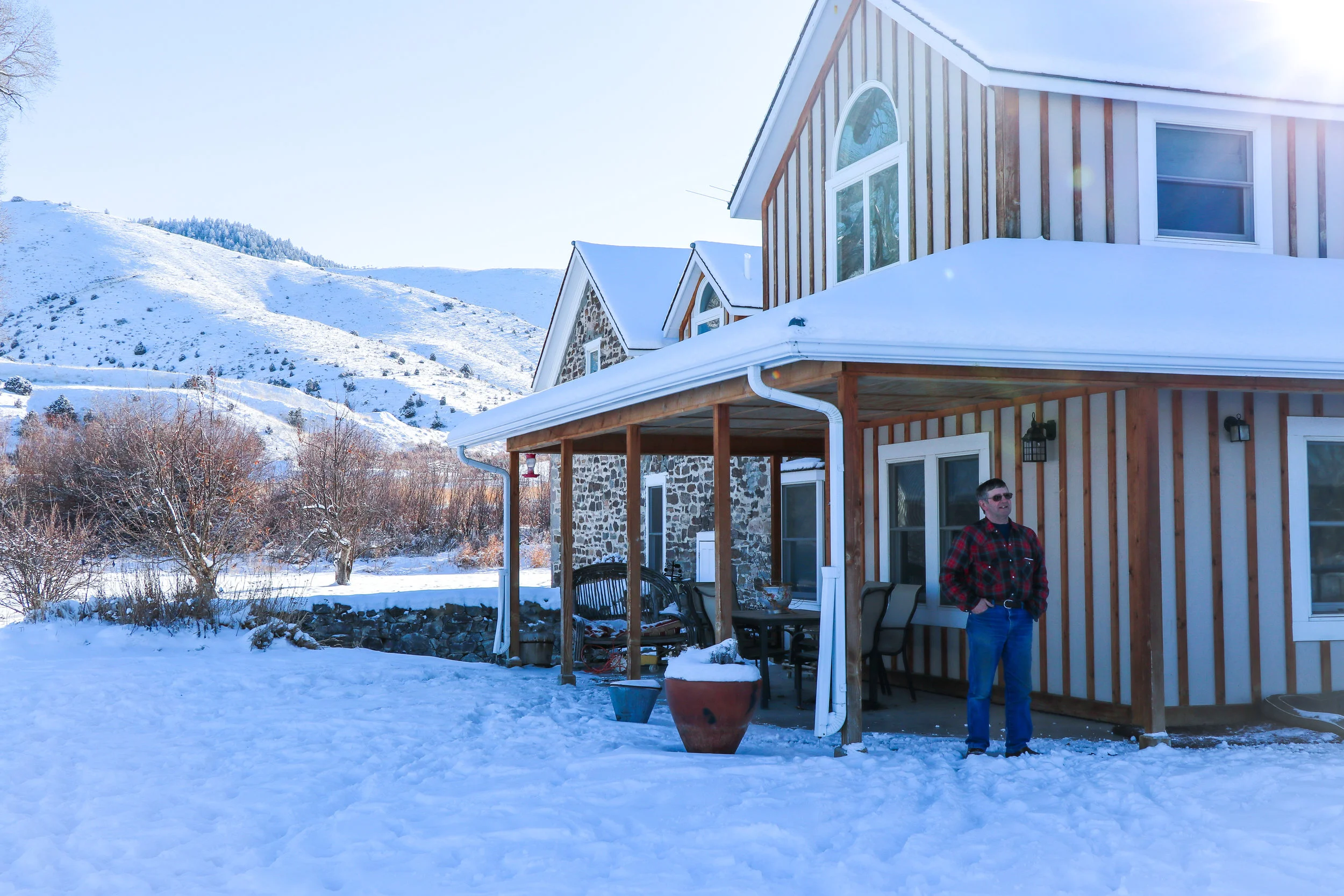 Rancher John Anderson outside his home on the Ruby Dell Ranch near Alder, Montana. (Photo Emmy Reed/GYC.)