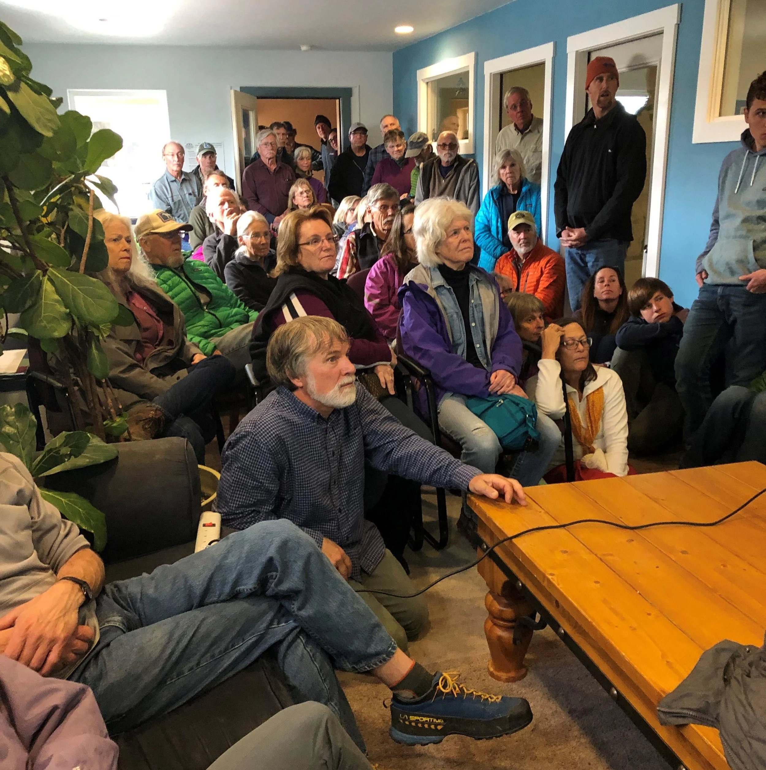 Recreationists pack the GYC Driggs office for a bear safety presentation by Jeremy Nicholson, Idaho Fish and Game’s bear biologist. (Photo GYC/Allison Michalski.)