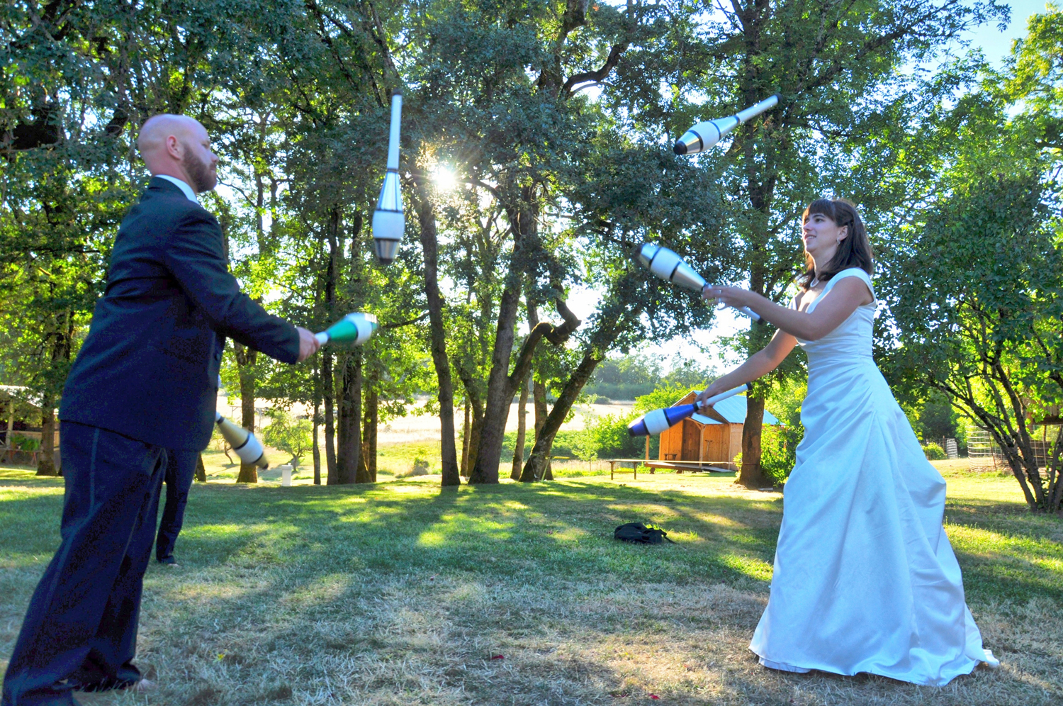 27. Weddings-Bride-Groom-Juggling-Pins_Carly-Carpenter.jpg