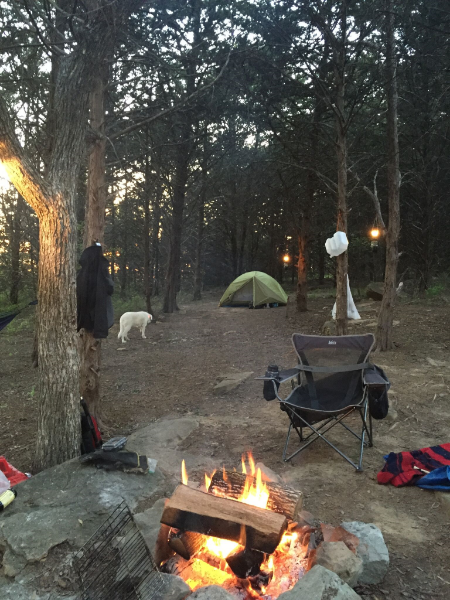 Within no time, Lee had worked his magic on a camp site and I helped by looking pretty and testing out the hammock. Please note the genius setup: hanging lanterns to light the path to the tent; hanging water container for easy bottle filling; even branches stood in for a key spot, leash holder and more.