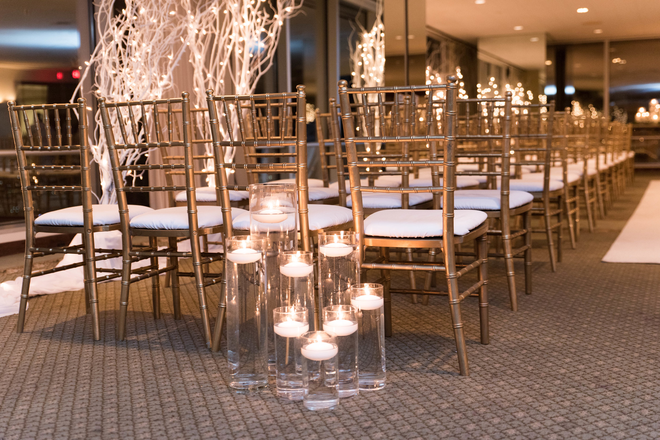  We kept things simple with floating candles flanking both sides the aisle. 