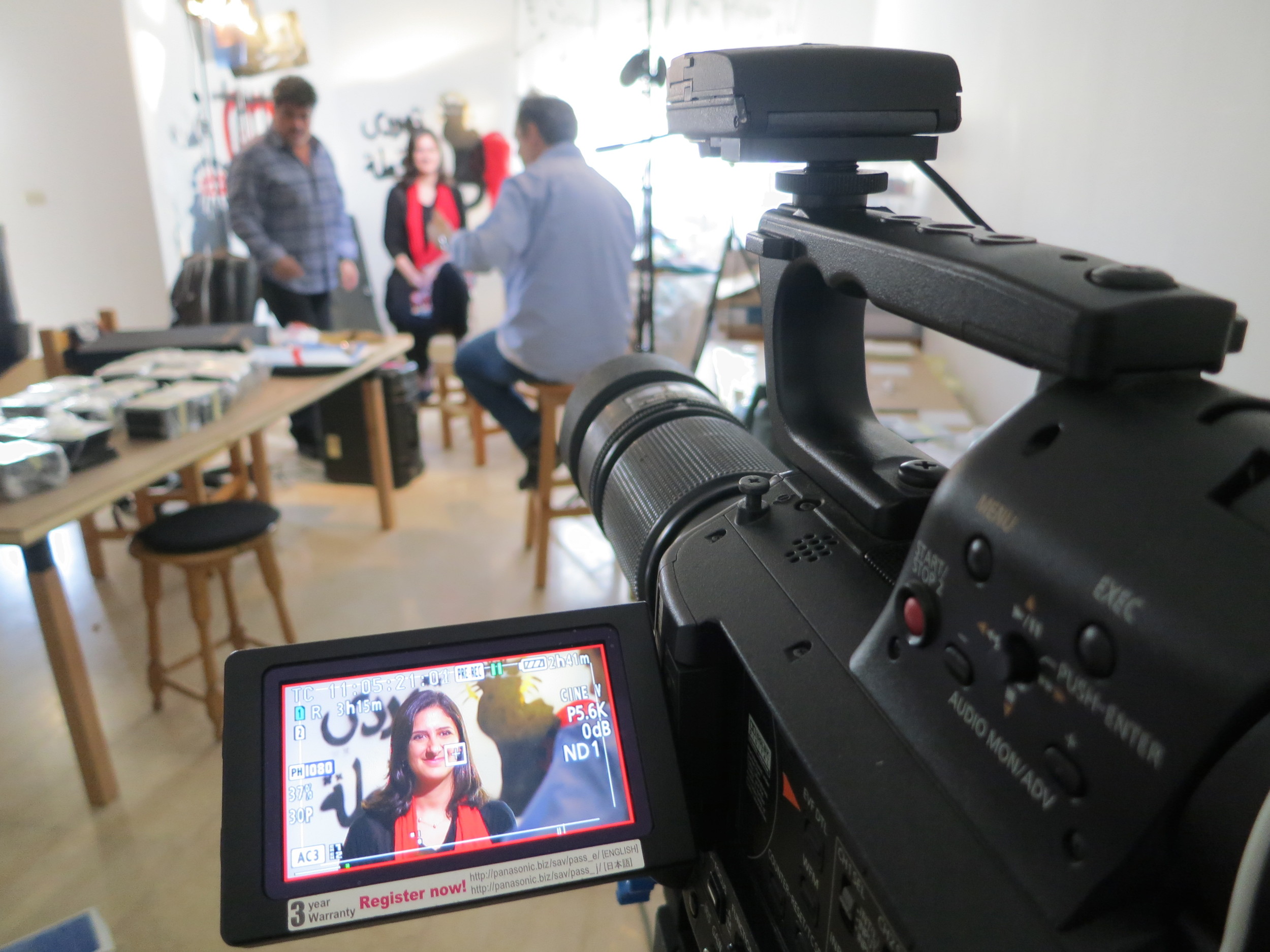  Mark and Oscar getting artist  Bahia Shehab &nbsp;ready for her interview. 