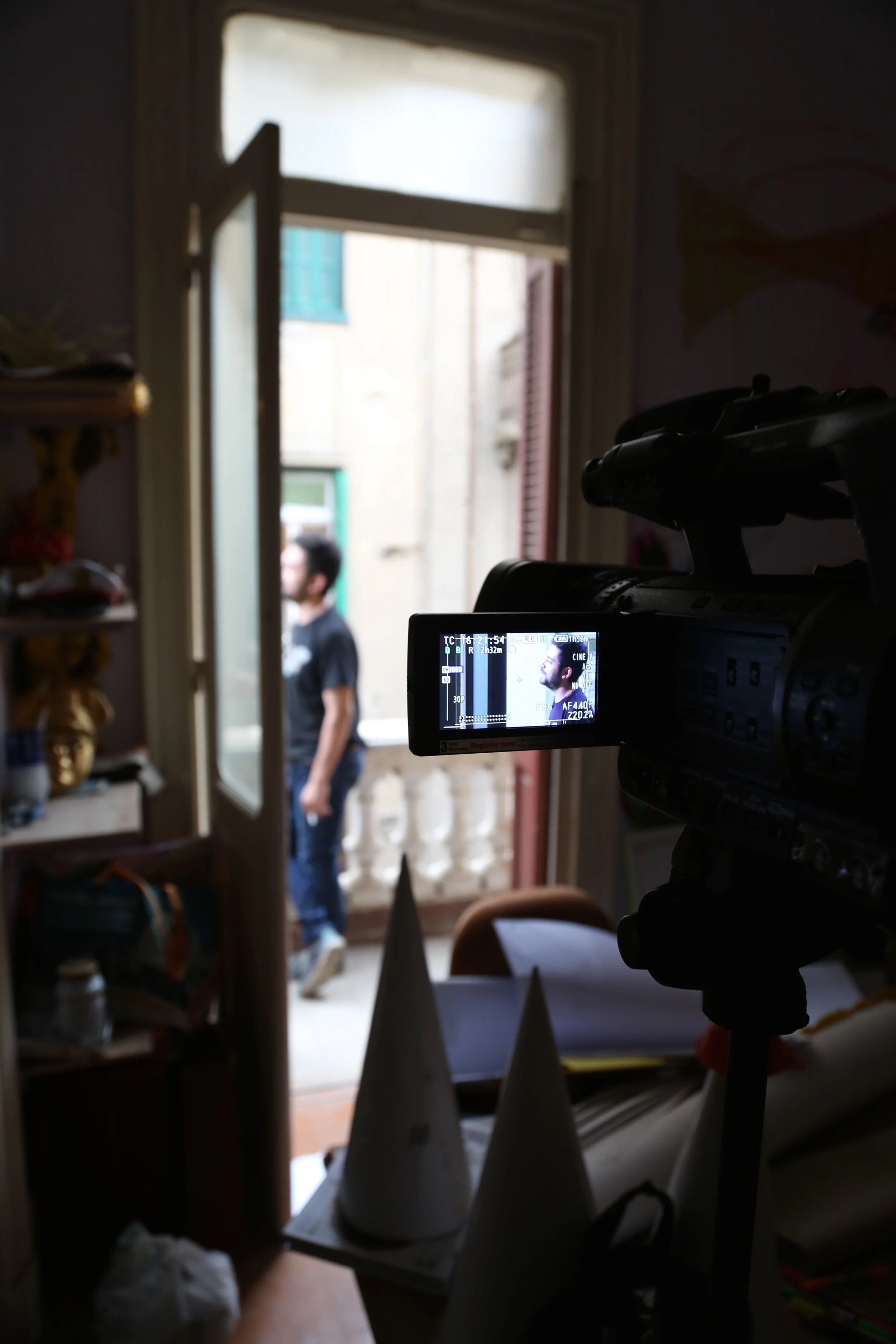  Artist&nbsp; Ammar Abo Bakr &nbsp;on the balcony of his Cairo studio/apartment during his interview. 