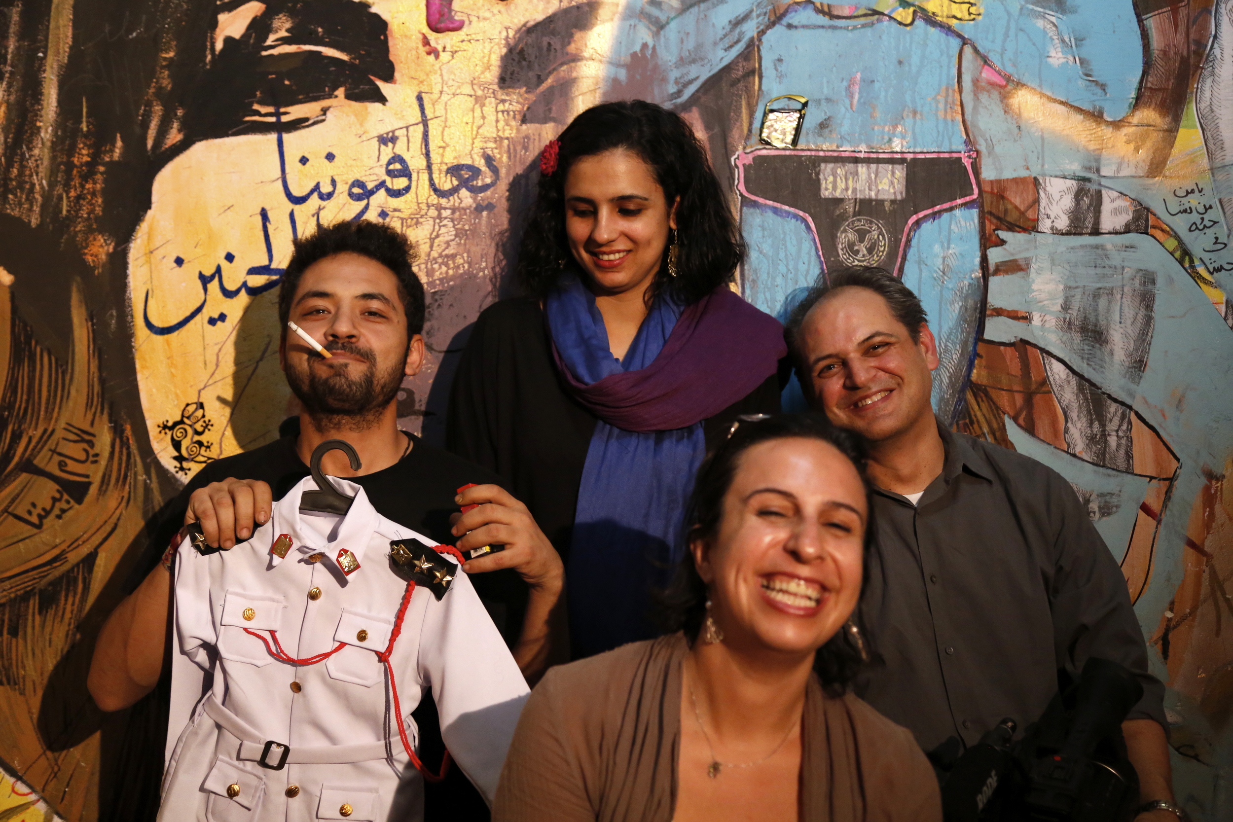  Artists  Ammar Abo Bakr  and  Salma Samy,  along with co-director  Racha Najdi  and director  Mark Nickolas , after a long evening of filming in Ammar's studio/apartment in Cairo. 