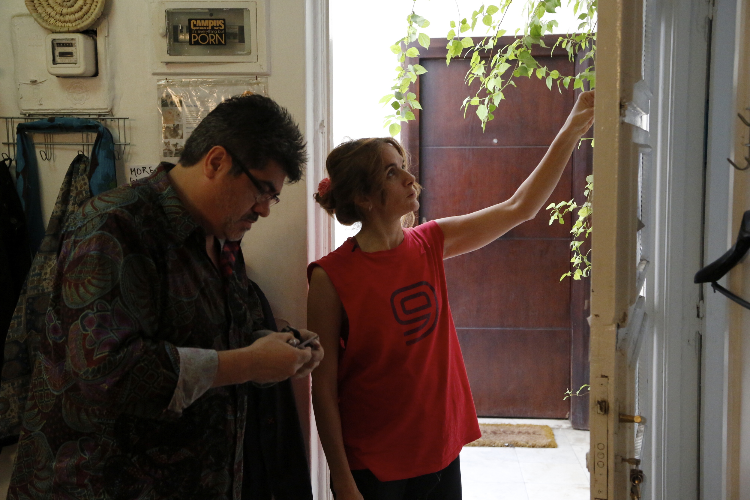  Cinematographer  Oscar Frasser  getting ready to film artist  Mira Shihadeh  during the morning yoga classes she teache sin her studio on Cairo's Zamalek island. 