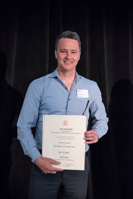 Matt O’Malia of GO Logic accepts the award for Alnoba.