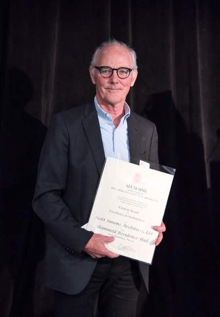Scott Simons of Scott Simons architects accepts the award for Shimmield Residence Hall.