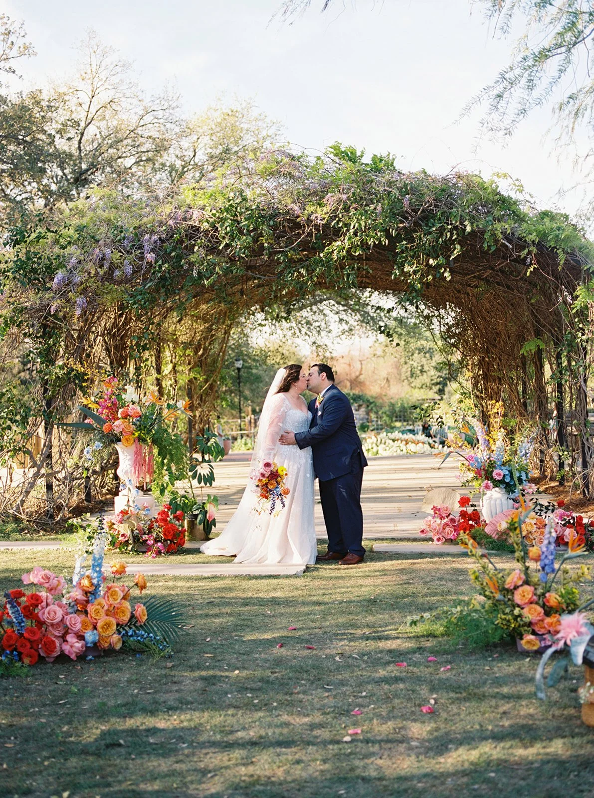 San Antonio Botanical Garden wedding ceremony couple by Austin wedding photographer