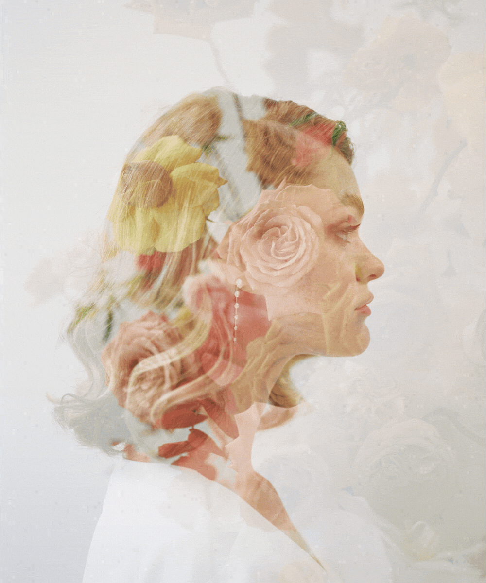 Double exposure of a woman's profile combined with floral elements, including roses and other flowers.