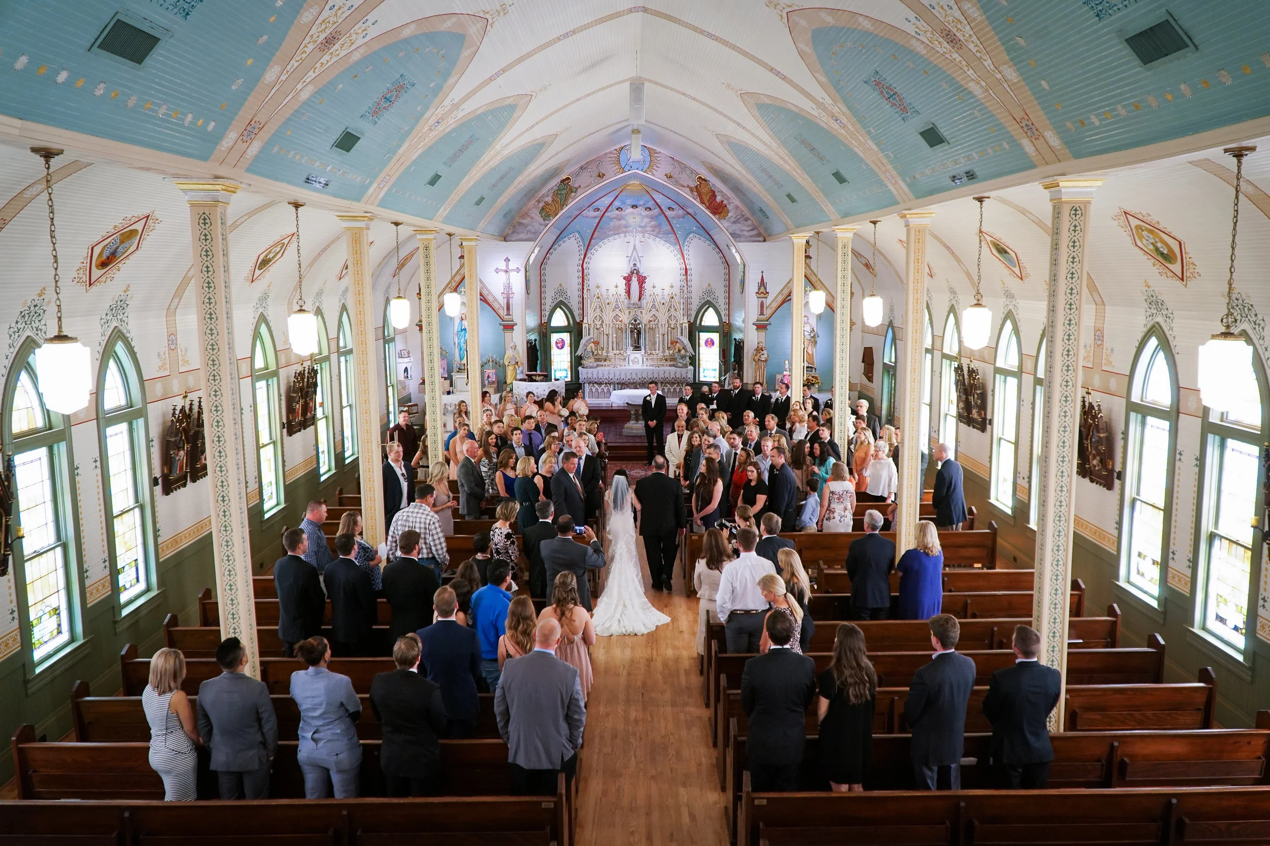 Olde Dobbin Station Houston Wedding Photographer. Wedding Photos from Olde Dobbin Station. Ceremony at St. Mary's Catholic Church in Montgomery, Texas.