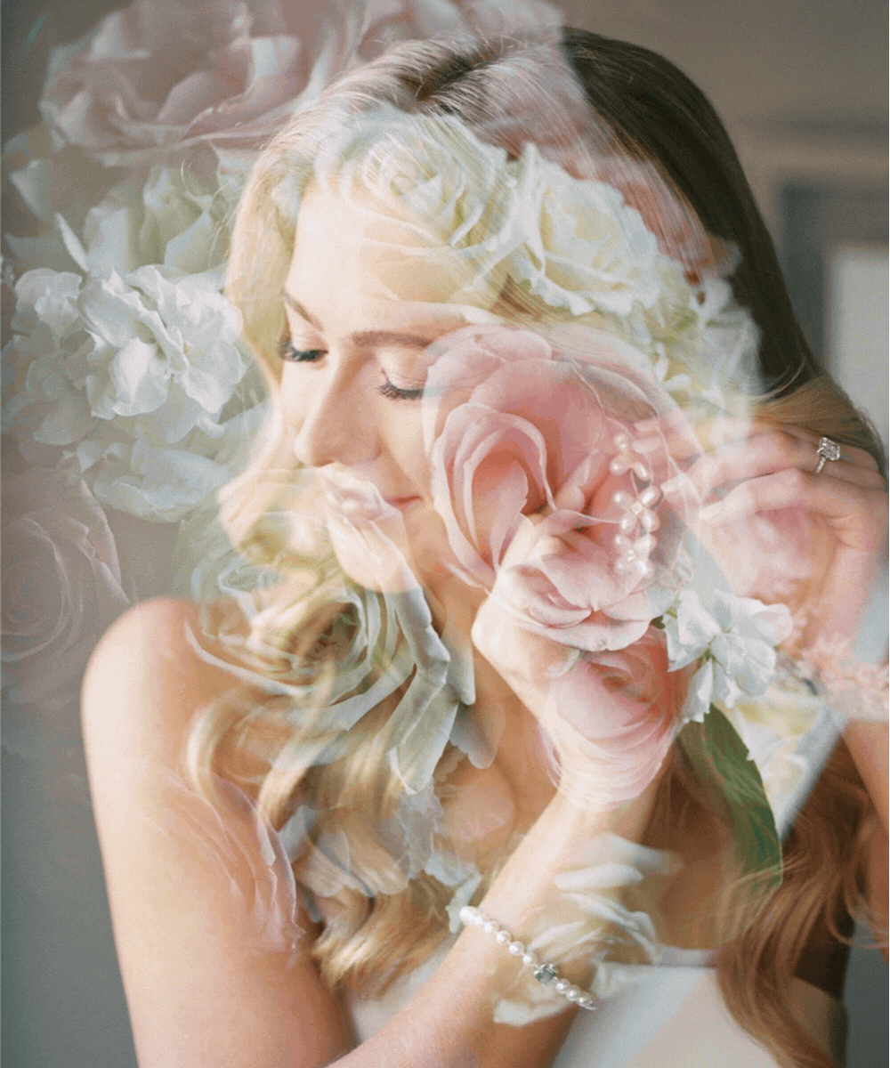 A woman with closed eyes holding pink and white roses, with floral overlays and soft lighting.