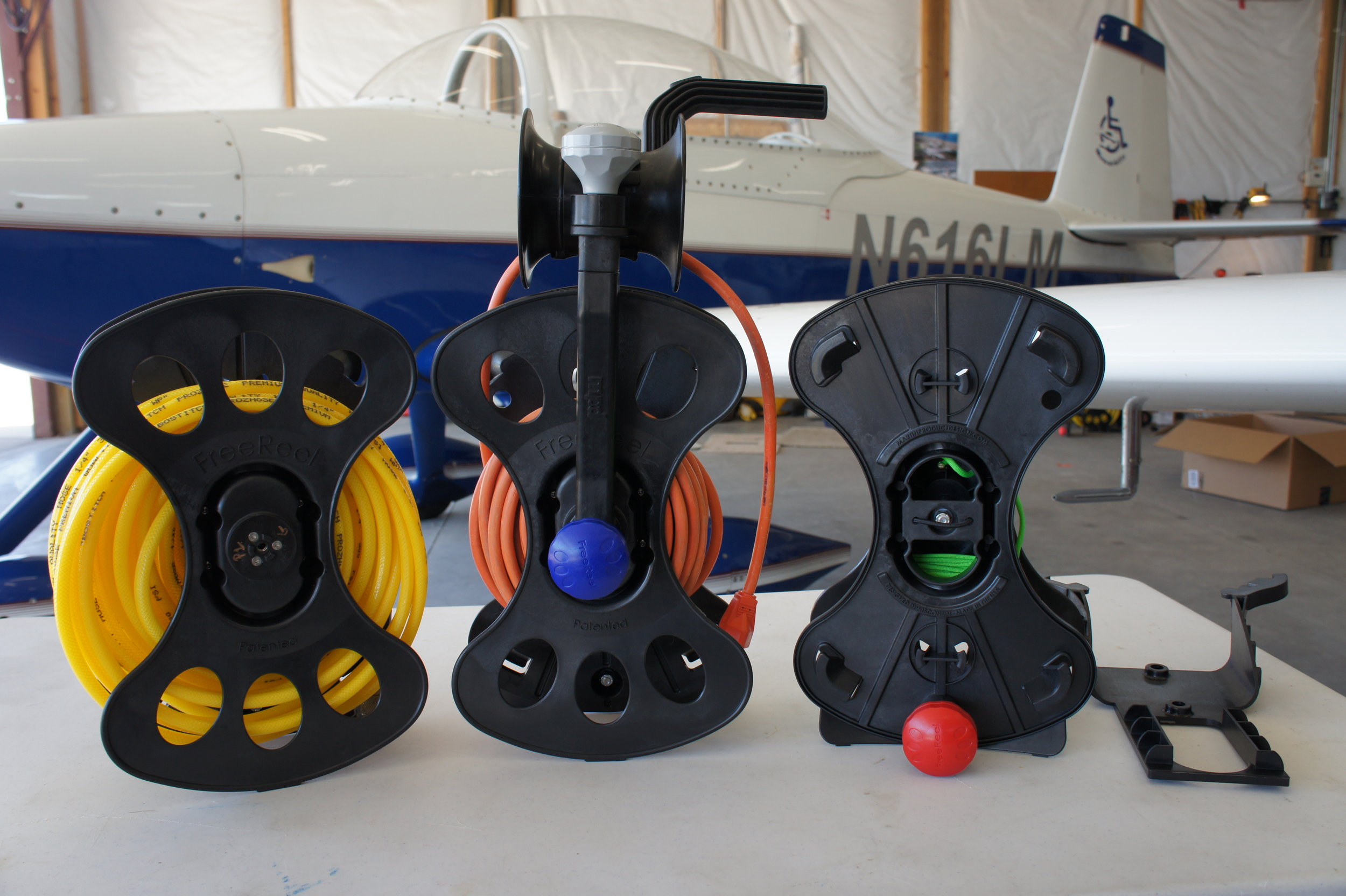 FreeReels with an air hose, a power cord and paracord