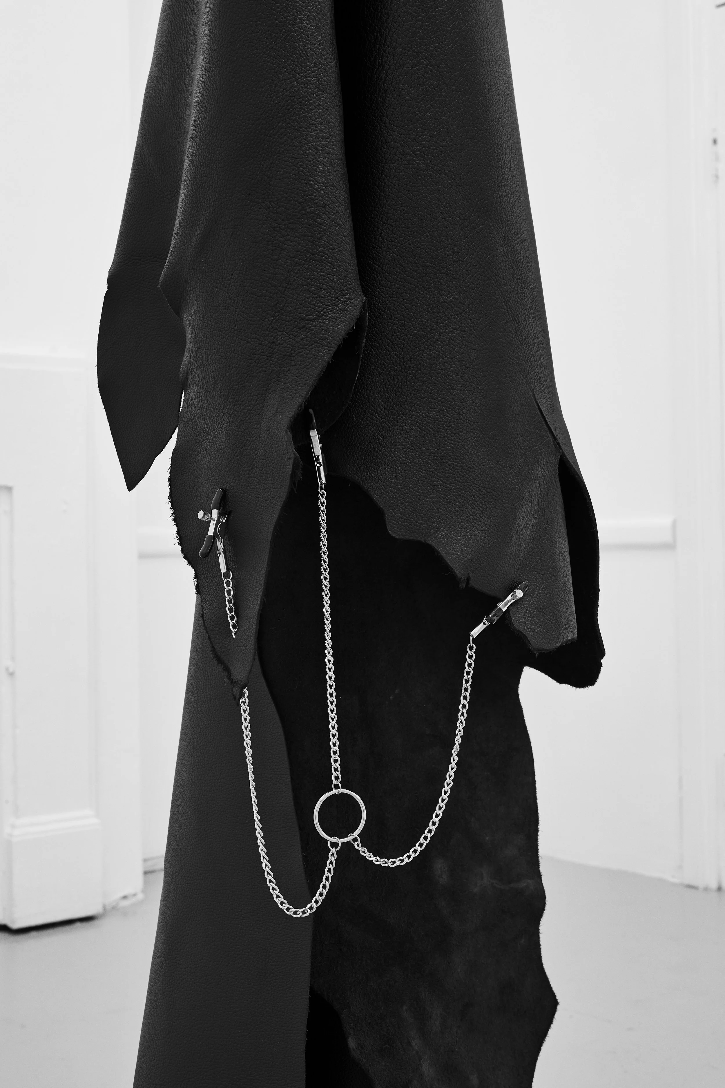 Untitled #5 from the series Holding my breath , 2019, leather hide, chain, hook, cuffs, clamps, 350 x 60 x 60 cm