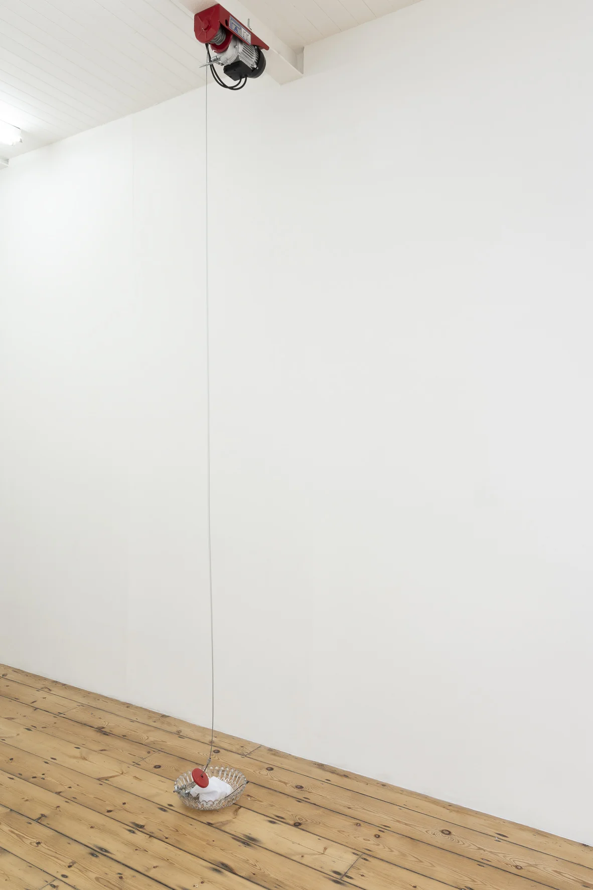 Anna McMahon, Of doubts and dreams , 2019, Dimensions variable Electric hoists, leather, cocktail fountain, baby’s breath (gypsophila), powdered milk, chain, cotton t-shirt, finger condoms, cock rings, bespoke handkerchief, nipple clamp with chain, weight, crystal bowl, English soft set honey, chair, trainers, human hair. Photograph: Manuela Barczewski