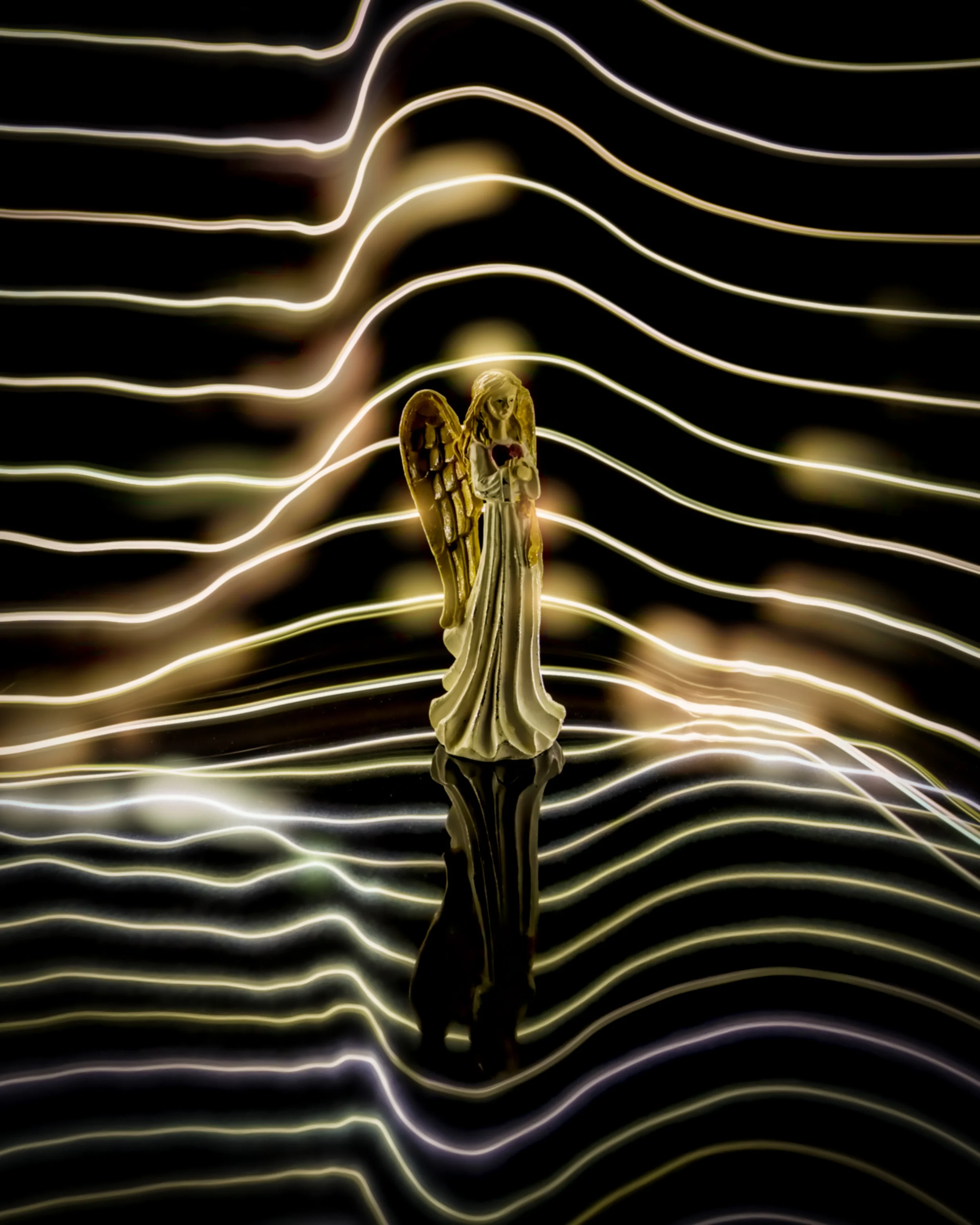 Angel statuette on black marble. (1 of 1).JPG