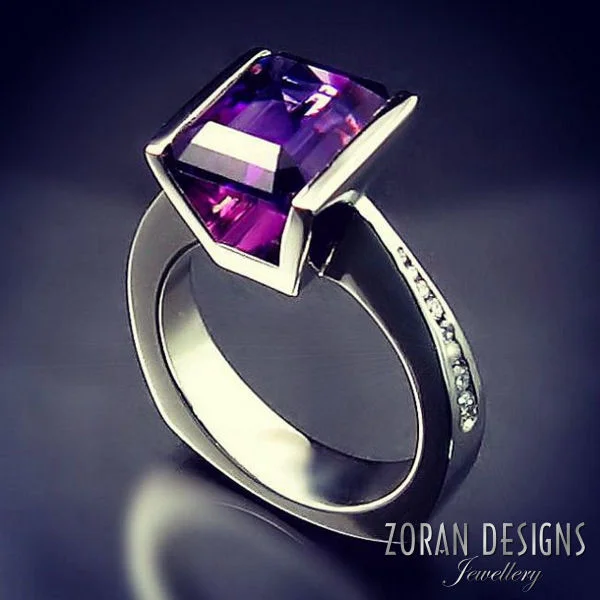 Custom designed ring in a modern setting with amethyst and diamonds