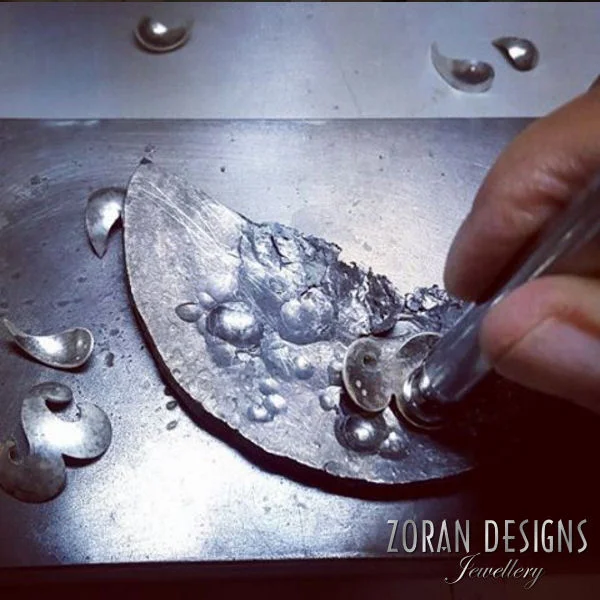 Jewelry making: hammering into shape