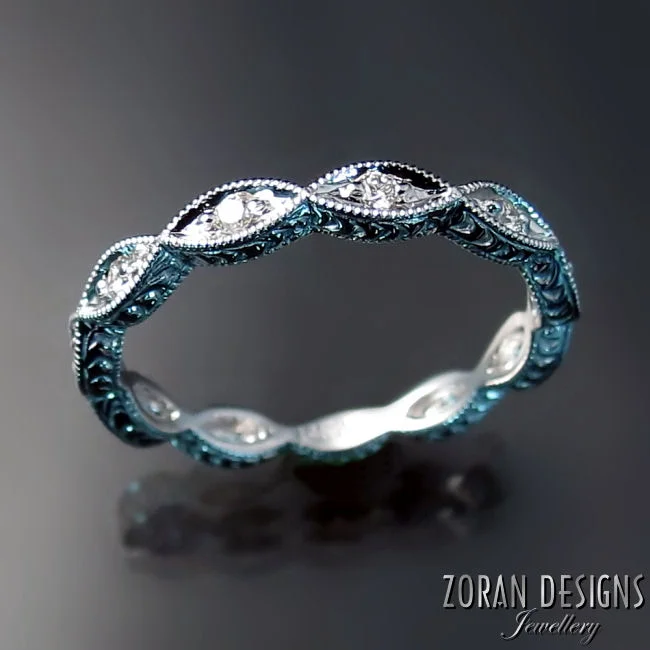 Wedding rings: scalloped band with diamonds