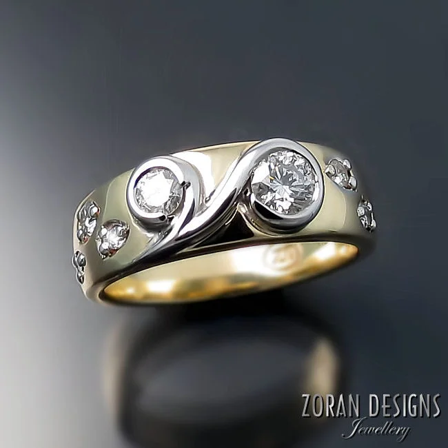 A fresh custom made ring in two tone gold made using stones from client's old jewellery