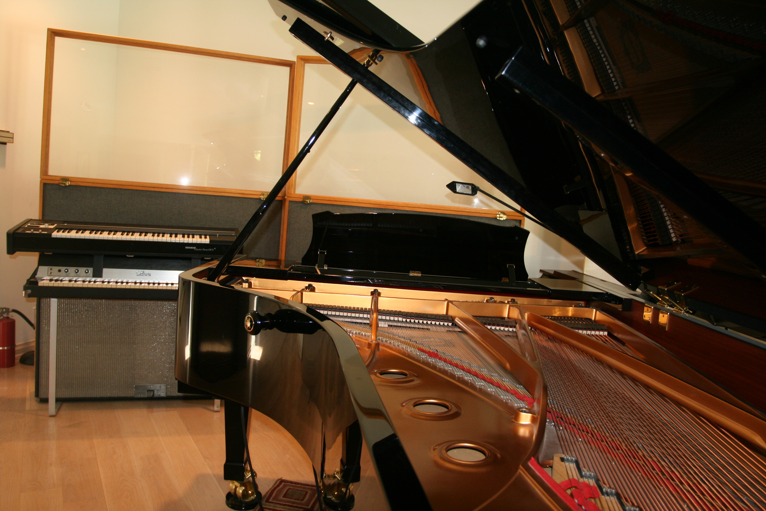 Real keys: A concert grand piano, Fender Rhodes, and Clavinet Pianet Duo