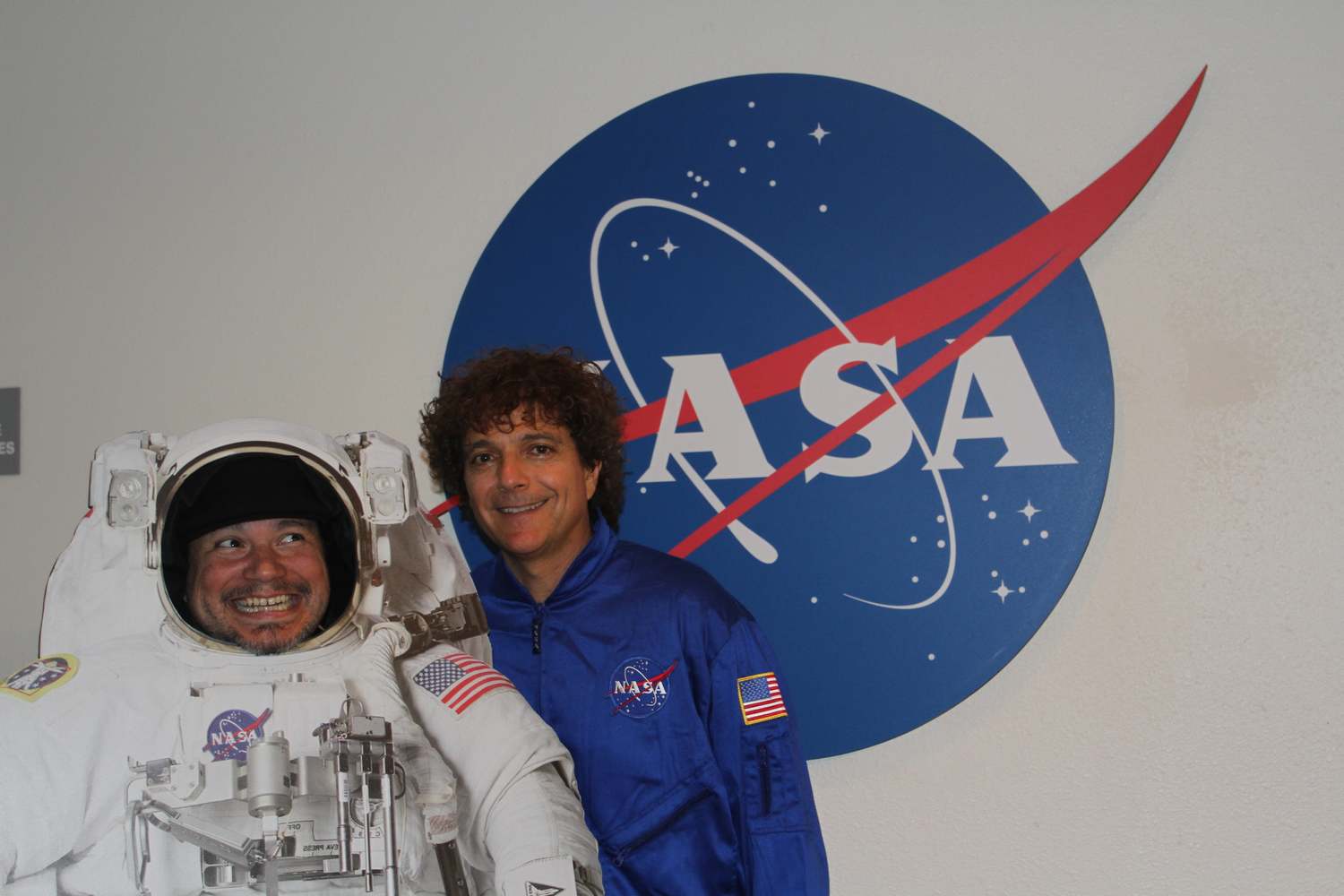 Asdru Sierra of Ozomatli (left) in an astronaut suit and Anthony Marinelli (right) in a flight-suit, at the NASA Ames, Conrad Foundation Spirit of Innovation Summit, Mountain View, CA, March, 2012.