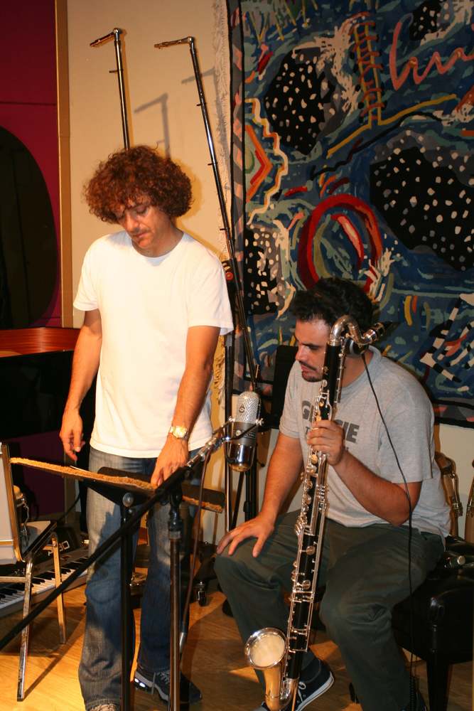 Anthony Marinelli (left) and Uli Bella (right) reviewing the bass clarinet part for Herb Alpert Whipped Cream and Other Delights REMIXED album in his Hollywood and Highland studio, Hollywood, CA, 2006