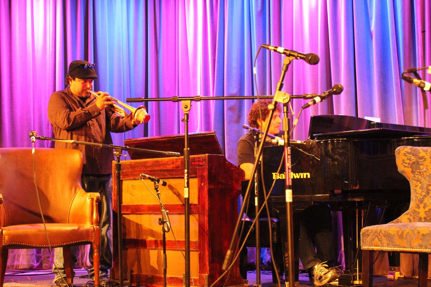 from left to right, performing duo Asdru Sierra of Ozomatli (vocals and trumpet) and Anthony Marinelli (piano and celeste) playing traditional Mexican songs at the Grammy Museum, Hollywood, CA, 2012