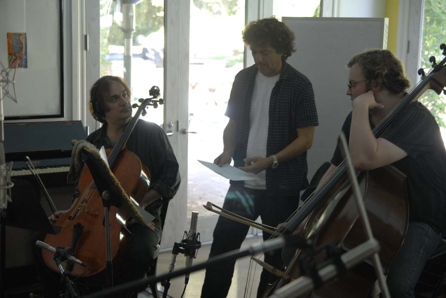 composer Anthony Marinelli working with string trio on the score to the feature film “Footsteps”, Encino, CA, 2006