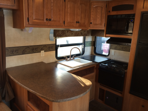 Observe the Super small oven and the multi level counter top