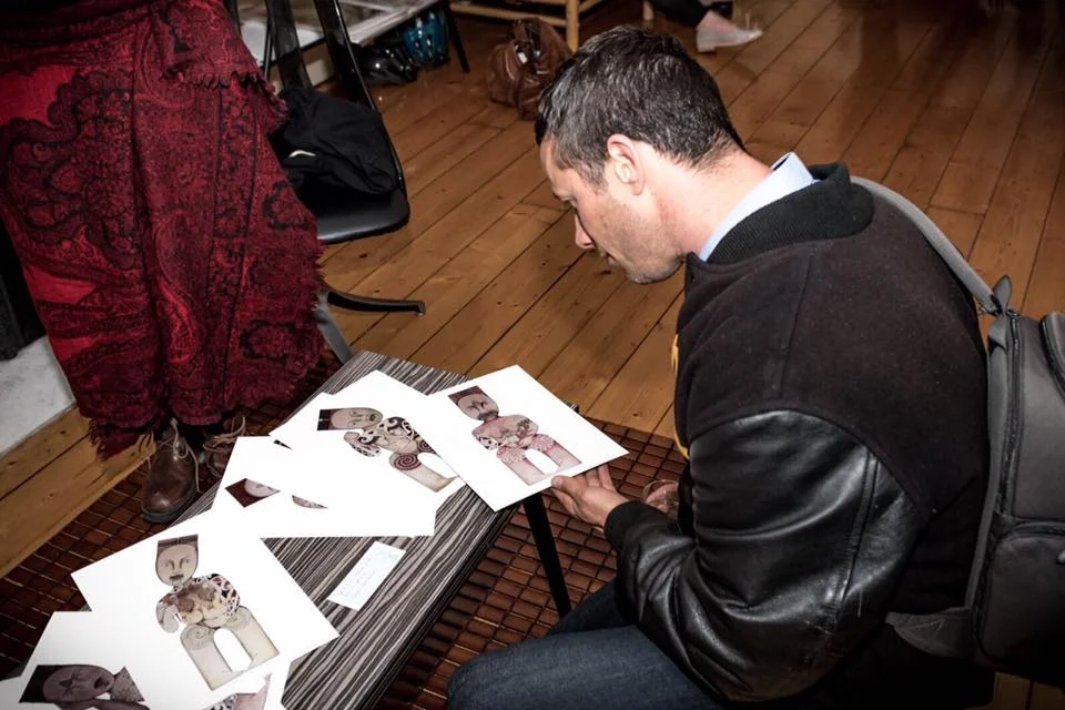 Viewing prints by celebrated Maori artist, Robyn Kahukiwa.