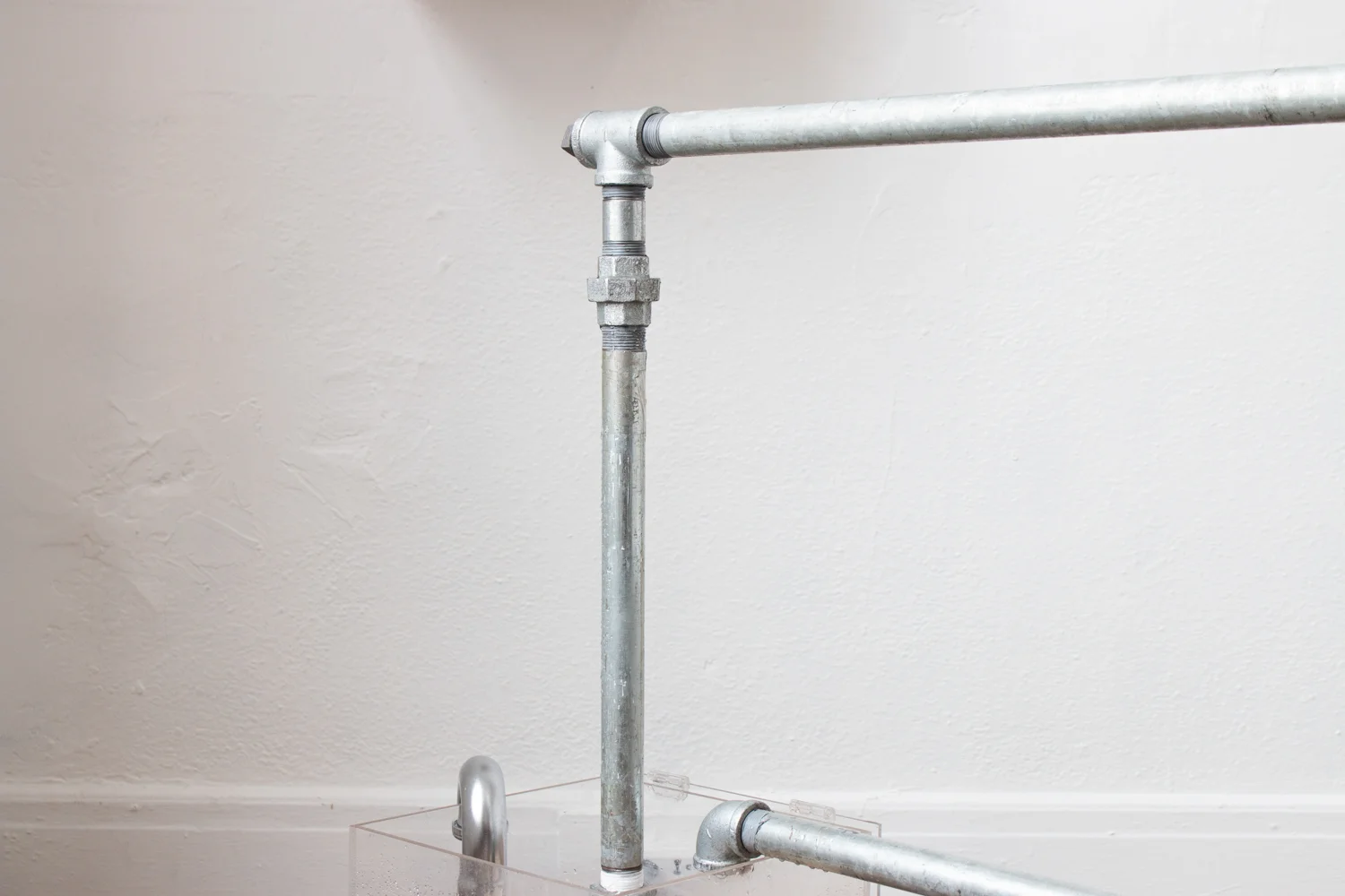 “Untitled Mirage 09 (Fountain)” Eye Wash Station, Galvanized Steel Pipes, Donation Box, Pond Pump, Potable Water (Caltech Resnick Institute : 4,820 mL ; Los Angeles County Museum of Art, Resnick Pavilion : 4,789 mL ; Hammer Museum : 4,139 mL ; Resnick Center for Food Law and Policy at UCLA School of Law : 4,039 mL). 2018 work in situ, completed 2019.