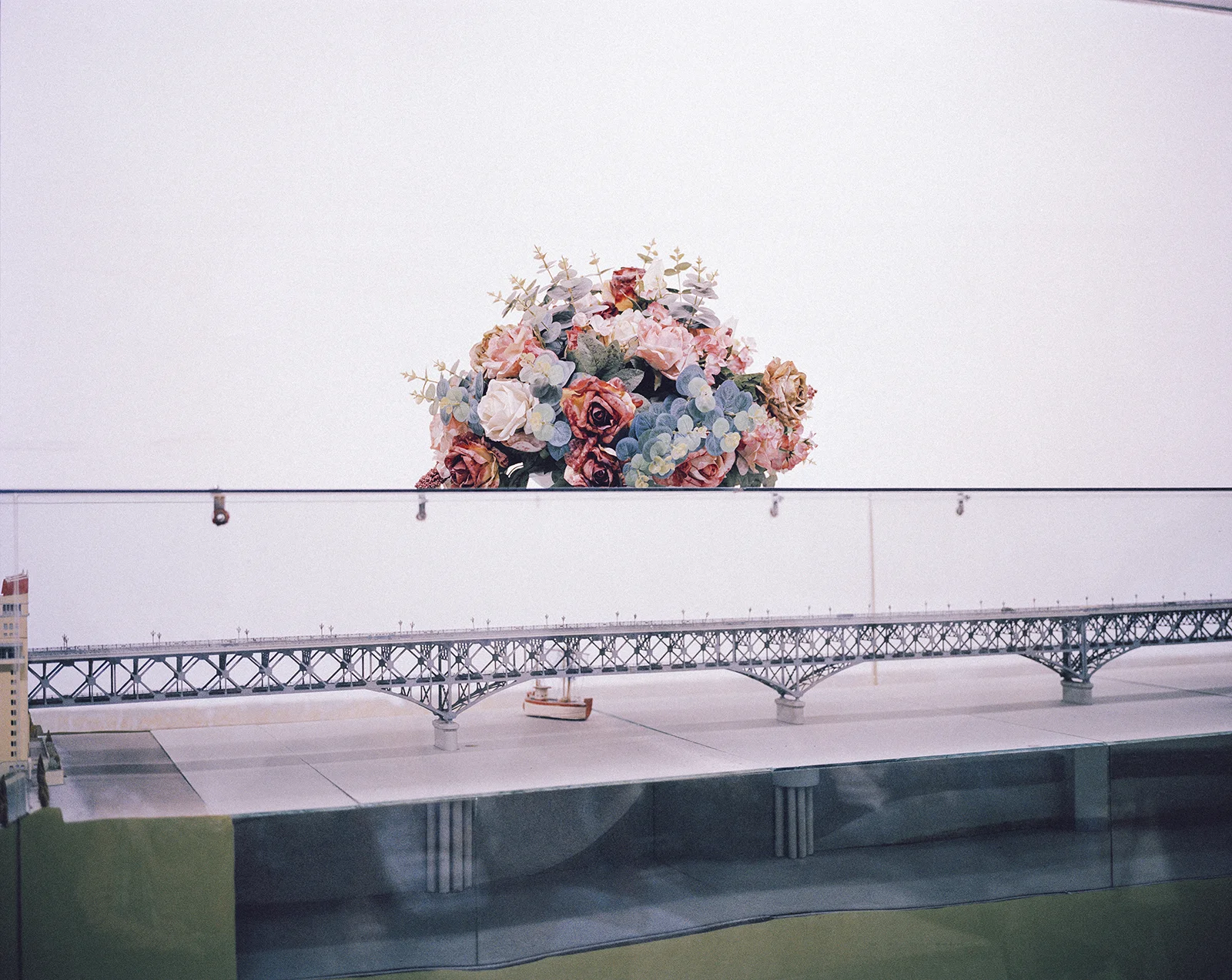 A diorama of the Nanjing Yangtze River Bridge sits beneath the real bridge. Nanjing, China, 2015.