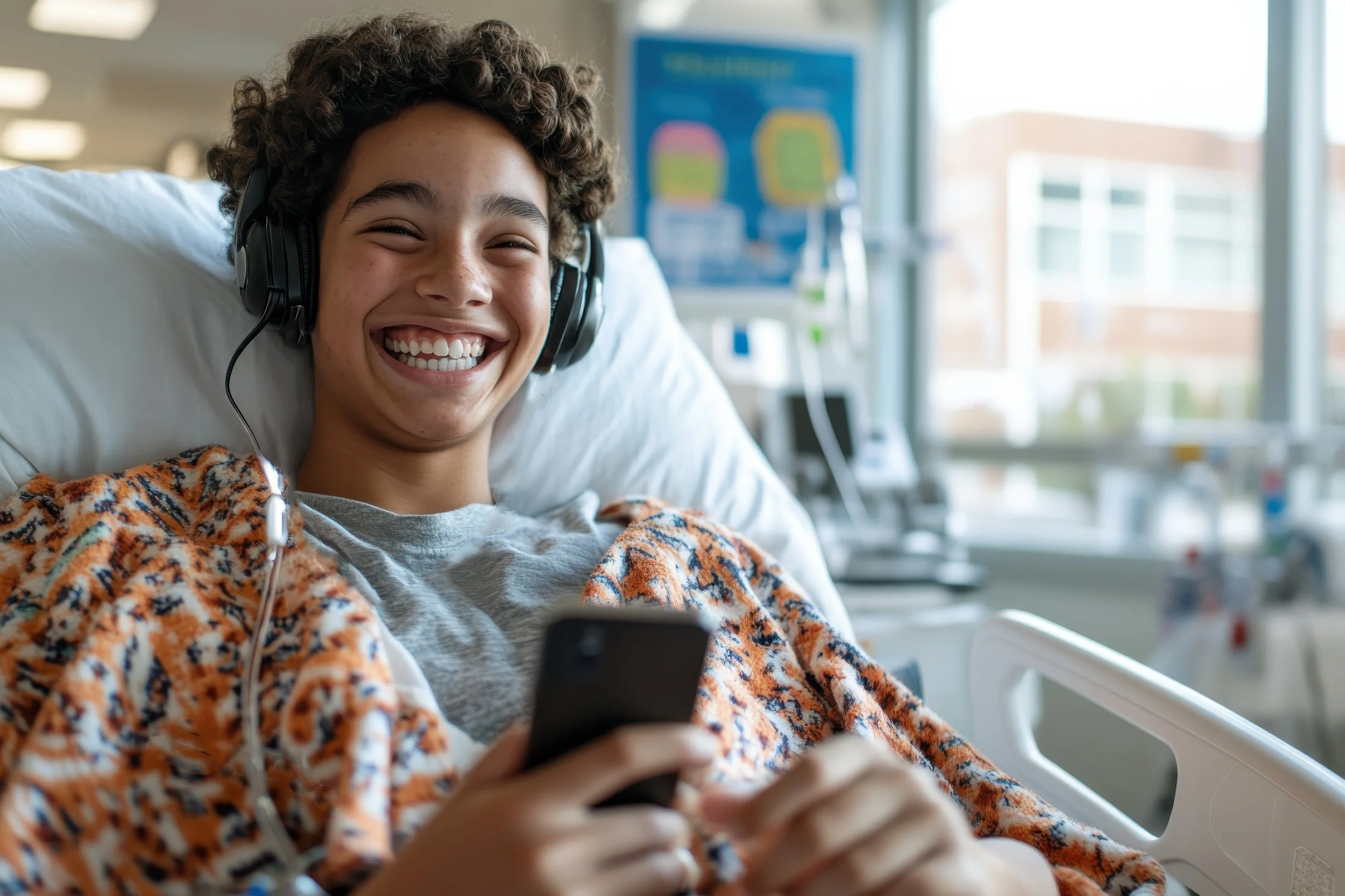 boy smiling in hospital.jpeg