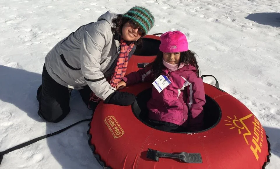 paula and daughter tubing.jpg