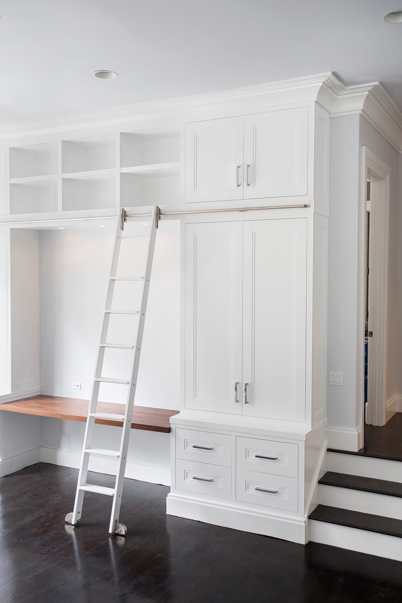 Painted Built-Ins With Rolling Ladder