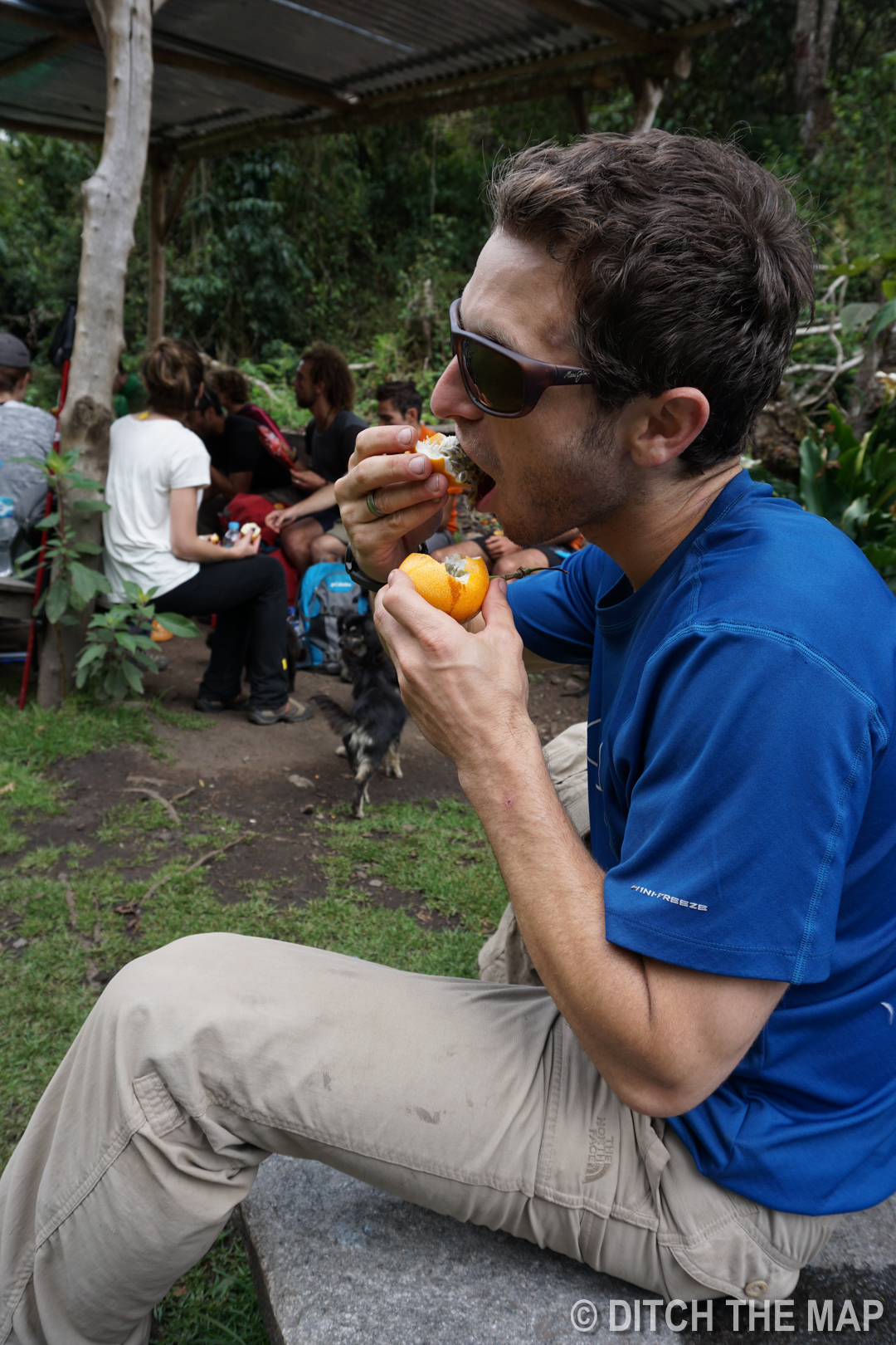 Scott eating passionfruit during the hike