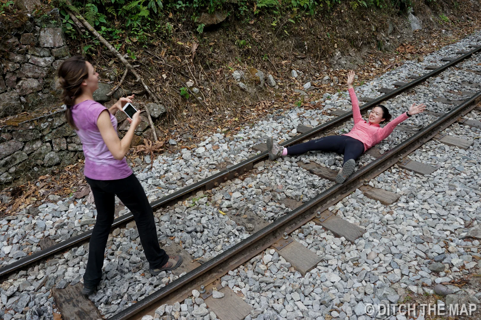 Angelica and Carmen play on the train tracks during our last 10km stretch to Aguas Calientes