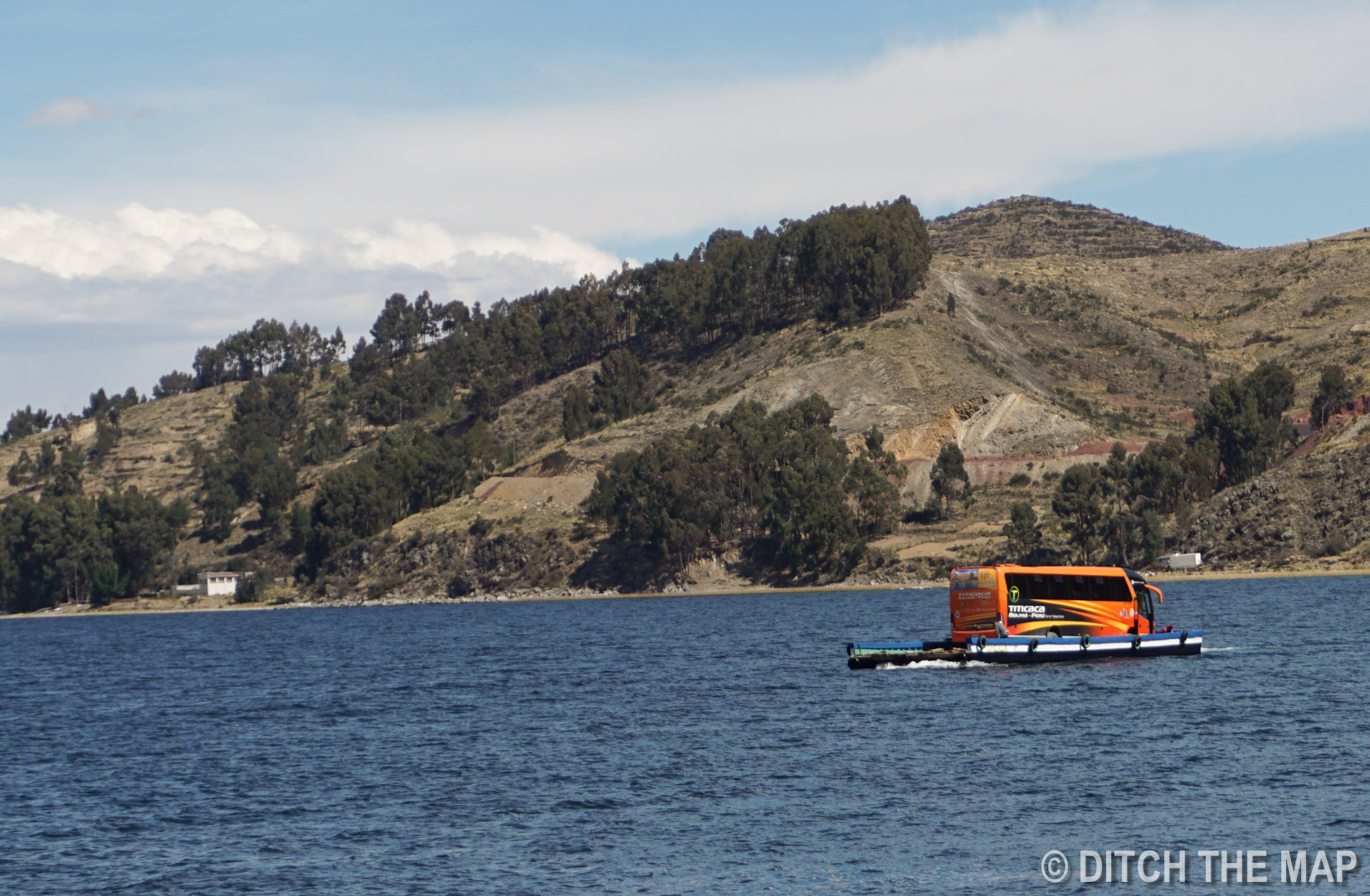 We take a ferry across Lake Titicaca...our bus follows!