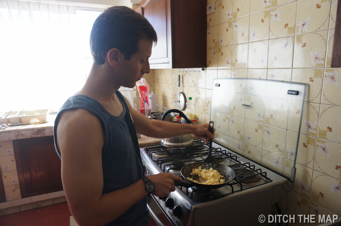 I cook breakfast for Sylvie in our hotel in La Paz, Bolivia