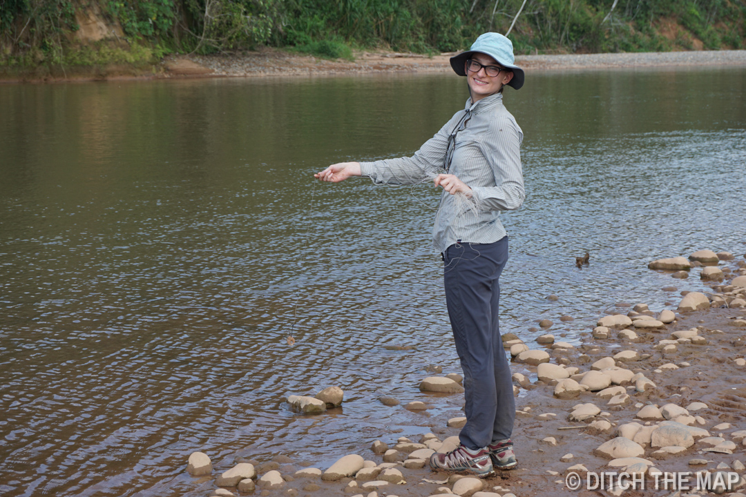 Sylvie fishes in the river during our trip to the Amazonian Jungle, Bolivia