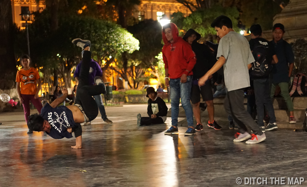 Breakdancers in the center square in Sucre, Bolivia