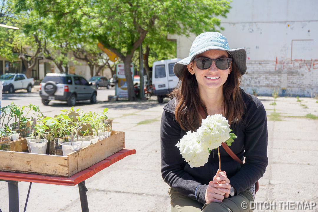 Sylvie selling plants in the Pueblo
