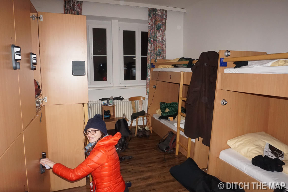 Sylvie locking her bags up at our hostel in Salzburg, Austria