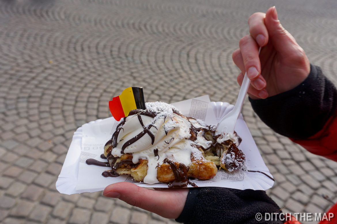 Eating waffles in Bruges, Belgium