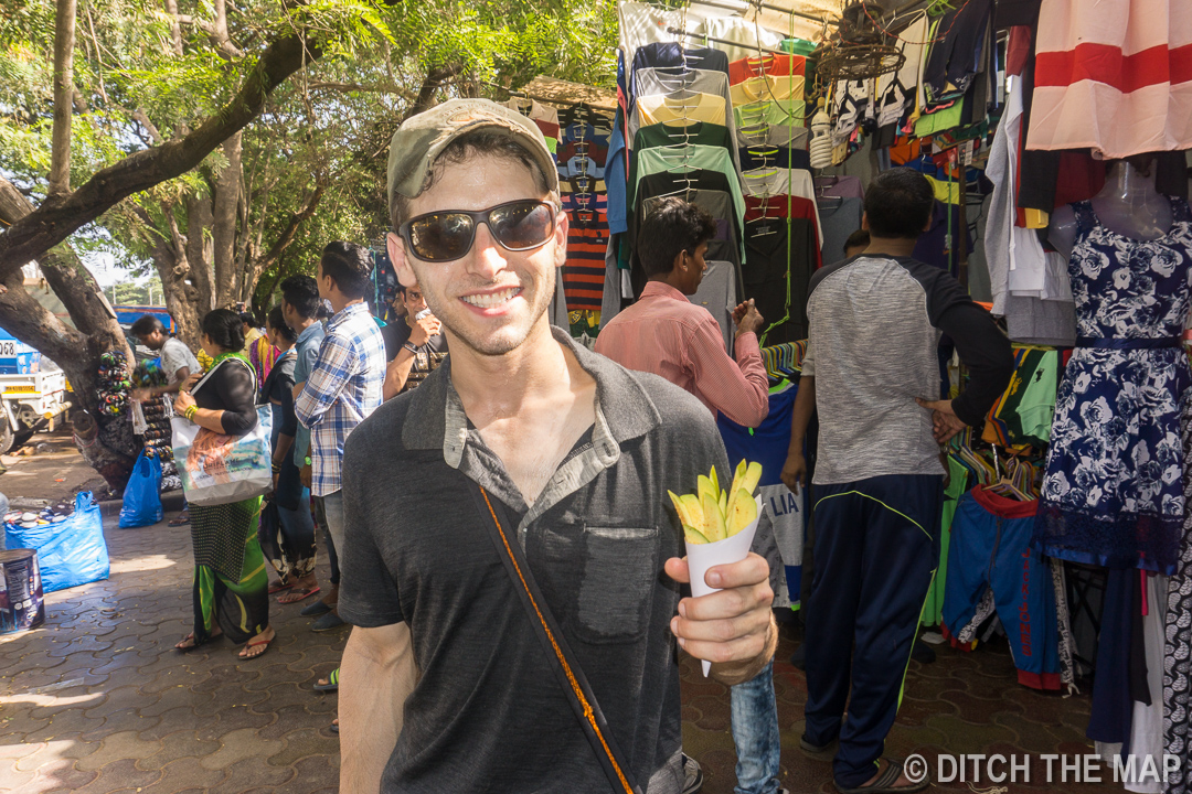 Enjoying Curry Spiced Unripe Mange in Mumbai, India
