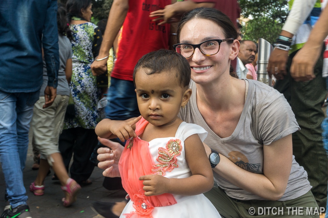 Posing for a photo in Mumbai, India