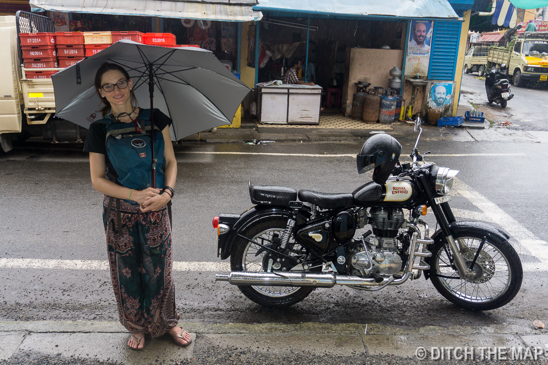 Sylvie by a parked motorcycle in Kochi, India