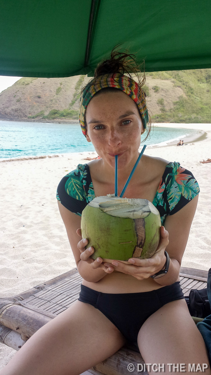 Sylvie Drinking a Fresh Coconut at Mawun Beach in Lombok, Indonesia
