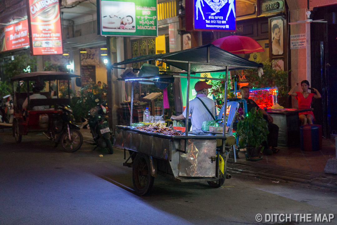 Guy Selling Skewers on the Street in Phnom Penh, Cambodia