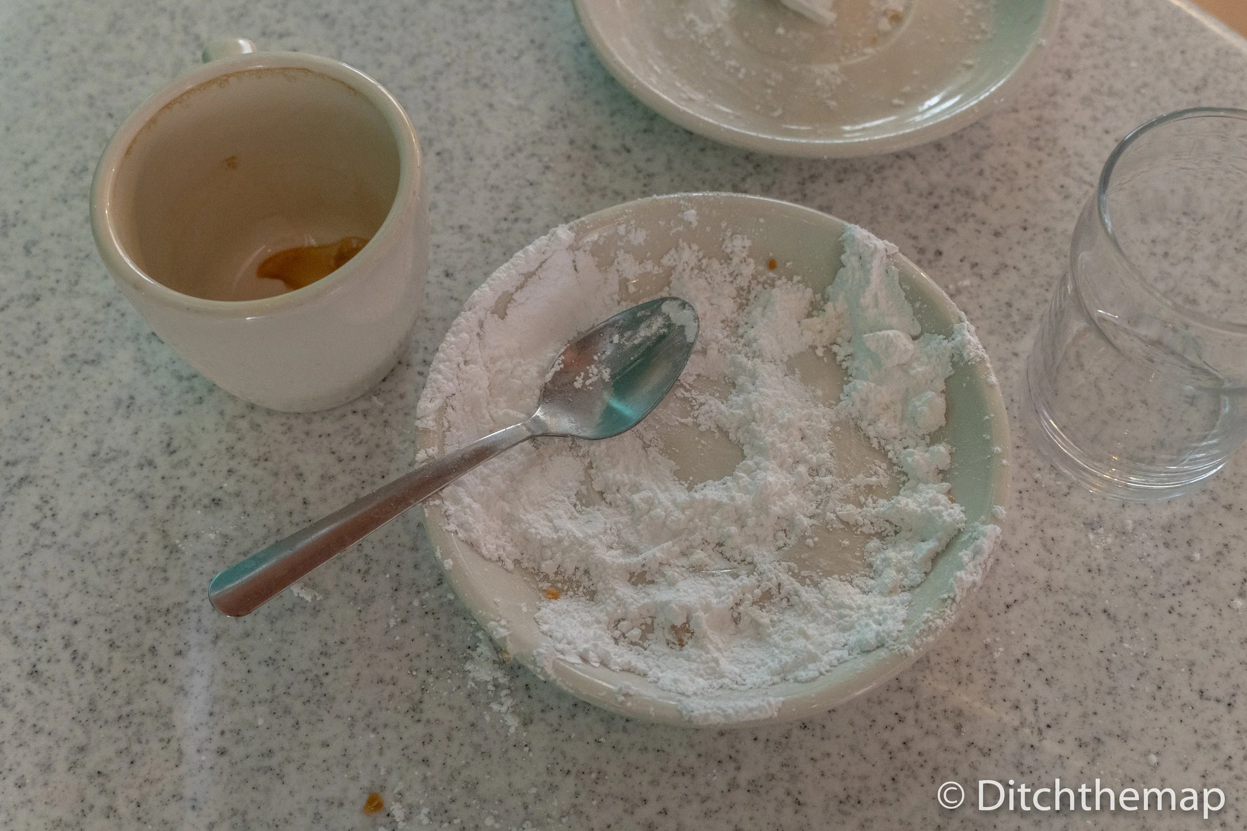 Enjoying Beignets and Cafe Au Lait